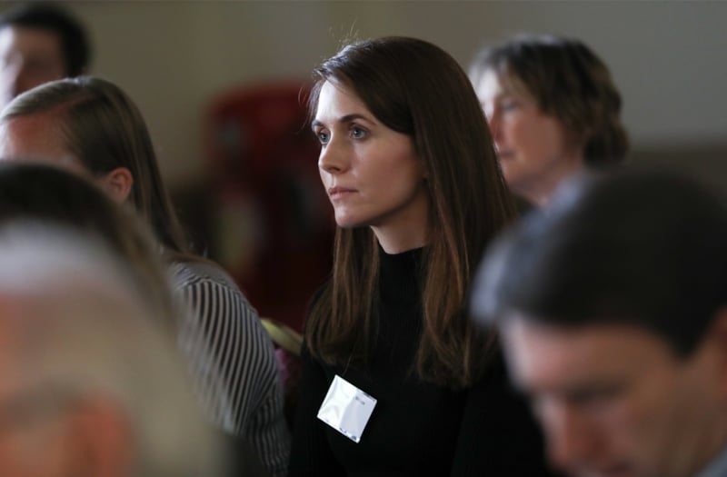 Female audience member at a CPD event